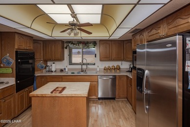 Spacious Lake-View Living with Room for Everything! This on London Bridge Golf Course in Arizona - for sale on GolfHomes.com, golf home, golf lot