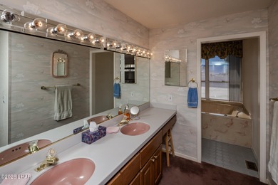 Spacious Lake-View Living with Room for Everything! This on London Bridge Golf Course in Arizona - for sale on GolfHomes.com, golf home, golf lot