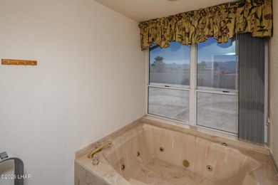 Spacious Lake-View Living with Room for Everything! This on London Bridge Golf Course in Arizona - for sale on GolfHomes.com, golf home, golf lot