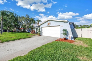 This spacious 4-bedroom, 2-bathroom pool home features a on Mangrove Bay Golf Course in Florida - for sale on GolfHomes.com, golf home, golf lot