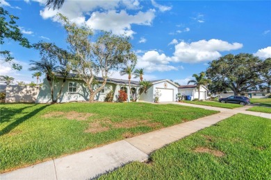 This spacious 4-bedroom, 2-bathroom pool home features a on Mangrove Bay Golf Course in Florida - for sale on GolfHomes.com, golf home, golf lot