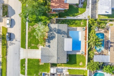 This spacious 4-bedroom, 2-bathroom pool home features a on Mangrove Bay Golf Course in Florida - for sale on GolfHomes.com, golf home, golf lot