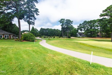 BREATHTAKING VIEWS OF THE 18TH GREEN! Nestled in a premier golf on Wildwood Green Golf Club in North Carolina - for sale on GolfHomes.com, golf home, golf lot
