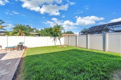 This spacious 4-bedroom, 2-bathroom pool home features a on Mangrove Bay Golf Course in Florida - for sale on GolfHomes.com, golf home, golf lot