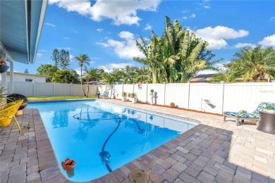 This spacious 4-bedroom, 2-bathroom pool home features a on Mangrove Bay Golf Course in Florida - for sale on GolfHomes.com, golf home, golf lot