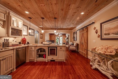 One of a kind custom home in River Forest. This home boasts curb on The Club River Forest in Georgia - for sale on GolfHomes.com, golf home, golf lot