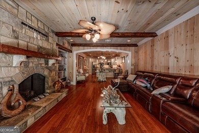 One of a kind custom home in River Forest. This home boasts curb on The Club River Forest in Georgia - for sale on GolfHomes.com, golf home, golf lot