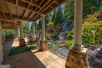 One of a kind custom home in River Forest. This home boasts curb on The Club River Forest in Georgia - for sale on GolfHomes.com, golf home, golf lot