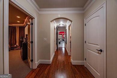 One of a kind custom home in River Forest. This home boasts curb on The Club River Forest in Georgia - for sale on GolfHomes.com, golf home, golf lot