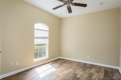 Upon opening the door to this brick 3 bedroom, 2 bath home in on Tiger Point Golf and Country Club in Florida - for sale on GolfHomes.com, golf home, golf lot