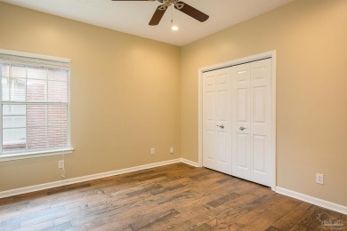 Upon opening the door to this brick 3 bedroom, 2 bath home in on Tiger Point Golf and Country Club in Florida - for sale on GolfHomes.com, golf home, golf lot