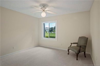 Enjoy your private entrance in this first floor, end unit condo on Martin County Golf Course in Florida - for sale on GolfHomes.com, golf home, golf lot