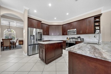 Lowest priced home in the Estates! 4 possible 5 bedroom split on Hammock Creek Golf Club in Florida - for sale on GolfHomes.com, golf home, golf lot