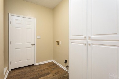 Upon opening the door to this brick 3 bedroom, 2 bath home in on Tiger Point Golf and Country Club in Florida - for sale on GolfHomes.com, golf home, golf lot