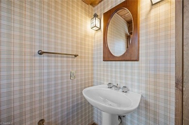 Nestled in the historic, golf course community of Sedgefield on Sedgefield Golf Course in North Carolina - for sale on GolfHomes.com, golf home, golf lot