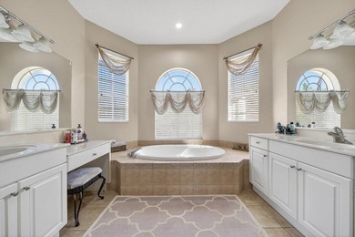 Lowest priced home in the Estates! 4 possible 5 bedroom split on Hammock Creek Golf Club in Florida - for sale on GolfHomes.com, golf home, golf lot