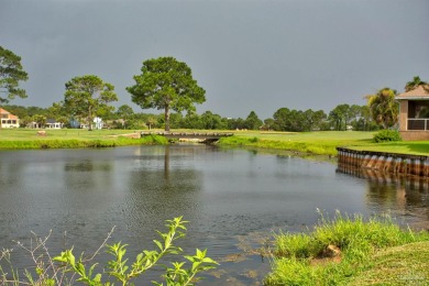 Upon opening the door to this brick 3 bedroom, 2 bath home in on Tiger Point Golf and Country Club in Florida - for sale on GolfHomes.com, golf home, golf lot