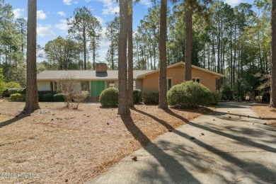 Charming home with great Golf Course views. This custom home was on Foxfire Golf and Country Club in North Carolina - for sale on GolfHomes.com, golf home, golf lot