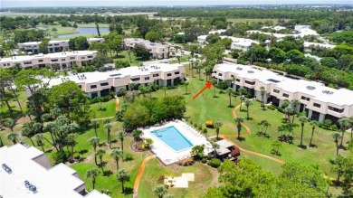 Enjoy your private entrance in this first floor, end unit condo on Martin County Golf Course in Florida - for sale on GolfHomes.com, golf home, golf lot