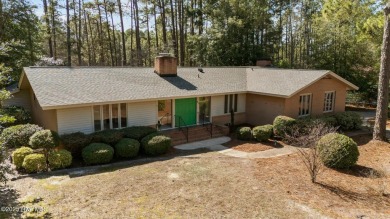 Charming home with great Golf Course views. This custom home was on Foxfire Golf and Country Club in North Carolina - for sale on GolfHomes.com, golf home, golf lot