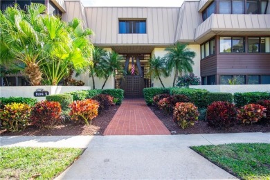 Enjoy your private entrance in this first floor, end unit condo on Martin County Golf Course in Florida - for sale on GolfHomes.com, golf home, golf lot