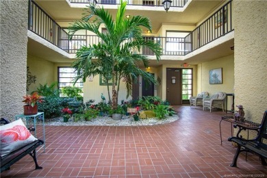 Enjoy your private entrance in this first floor, end unit condo on Martin County Golf Course in Florida - for sale on GolfHomes.com, golf home, golf lot