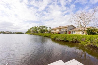 RARELY AVAILABLE RIVERFRONT! Outstanding views are yours with on Riverbend Golf Club in Florida - for sale on GolfHomes.com, golf home, golf lot