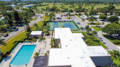 Enjoy your private entrance in this first floor, end unit condo on Martin County Golf Course in Florida - for sale on GolfHomes.com, golf home, golf lot
