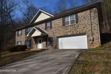 Ready for a new owner! About 5 minutes to Oak Ridge or head west on Oak Ridge Country Club in Tennessee - for sale on GolfHomes.com, golf home, golf lot