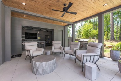You'll find classic elegance in this transitional-style lake on Reynolds Lake Oconee - The Oconee in Georgia - for sale on GolfHomes.com, golf home, golf lot