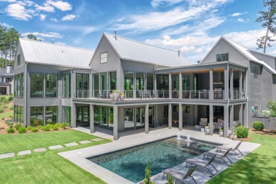 You'll find classic elegance in this transitional-style lake on Reynolds Lake Oconee - The Oconee in Georgia - for sale on GolfHomes.com, golf home, golf lot