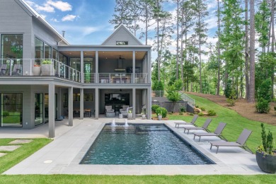 You'll find classic elegance in this transitional-style lake on Reynolds Lake Oconee - The Oconee in Georgia - for sale on GolfHomes.com, golf home, golf lot