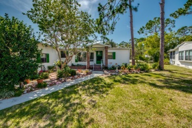 Great 2/2 split floor plan home located on a corner lot in Pine on Pine Lakes Country Club in Florida - for sale on GolfHomes.com, golf home, golf lot
