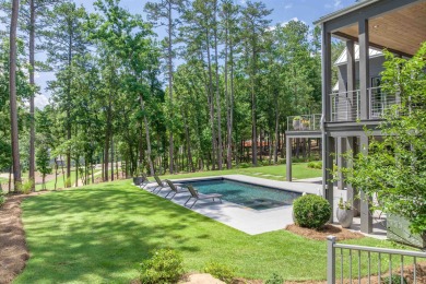 You'll find classic elegance in this transitional-style lake on Reynolds Lake Oconee - The Oconee in Georgia - for sale on GolfHomes.com, golf home, golf lot