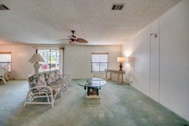 Great 2/2 split floor plan home located on a corner lot in Pine on Pine Lakes Country Club in Florida - for sale on GolfHomes.com, golf home, golf lot