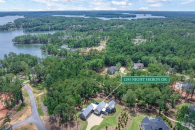 You'll find classic elegance in this transitional-style lake on Reynolds Lake Oconee - The Oconee in Georgia - for sale on GolfHomes.com, golf home, golf lot