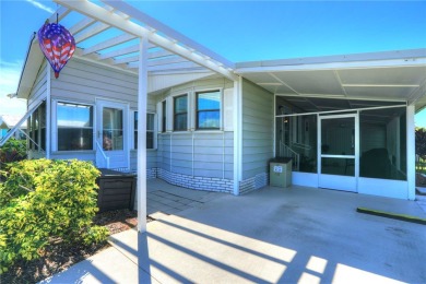 MOTIVATED SELLER! For sale in Barefoot Bay~ This 2 bed 2 bath on Barefoot Bay Golf Course in Florida - for sale on GolfHomes.com, golf home, golf lot