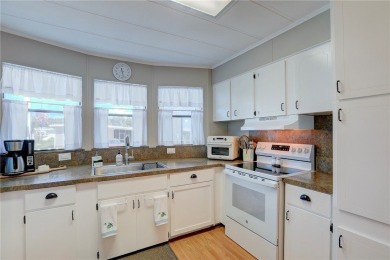 MOTIVATED SELLER! For sale in Barefoot Bay~ This 2 bed 2 bath on Barefoot Bay Golf Course in Florida - for sale on GolfHomes.com, golf home, golf lot
