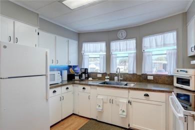 MOTIVATED SELLER! For sale in Barefoot Bay~ This 2 bed 2 bath on Barefoot Bay Golf Course in Florida - for sale on GolfHomes.com, golf home, golf lot