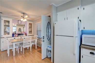 MOTIVATED SELLER! For sale in Barefoot Bay~ This 2 bed 2 bath on Barefoot Bay Golf Course in Florida - for sale on GolfHomes.com, golf home, golf lot