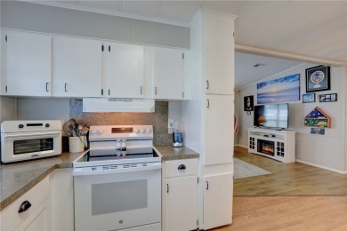 MOTIVATED SELLER! For sale in Barefoot Bay~ This 2 bed 2 bath on Barefoot Bay Golf Course in Florida - for sale on GolfHomes.com, golf home, golf lot
