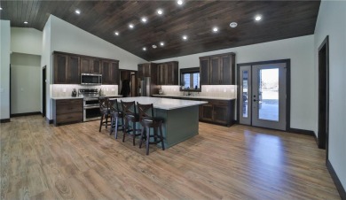 Don't miss this new construction three bedroom, three bath golf on Blueberry Pines Golf CLub in Minnesota - for sale on GolfHomes.com, golf home, golf lot