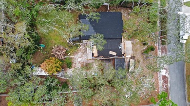 Build your dream home on this rare 0.47 acre corner lot located on Tuscawilla Country Club in Florida - for sale on GolfHomes.com, golf home, golf lot