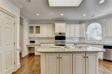 Nestled within the prestigious, guard-gated enclave of St Ives on St. Ives Golf and Country Club in Georgia - for sale on GolfHomes.com, golf home, golf lot