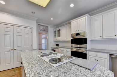 Nestled within the prestigious, guard-gated enclave of St Ives on St. Ives Golf and Country Club in Georgia - for sale on GolfHomes.com, golf home, golf lot