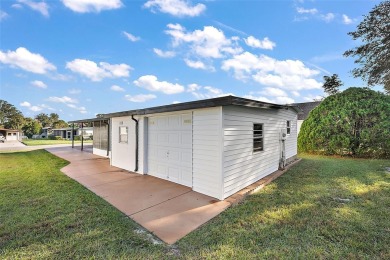 Welcome to this charming two-bedroom, one-bathroom home nestled on El Diablo Executive Golf Course in Florida - for sale on GolfHomes.com, golf home, golf lot