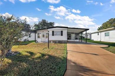 Welcome to this charming two-bedroom, one-bathroom home nestled on El Diablo Executive Golf Course in Florida - for sale on GolfHomes.com, golf home, golf lot