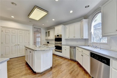 Nestled within the prestigious, guard-gated enclave of St Ives on St. Ives Golf and Country Club in Georgia - for sale on GolfHomes.com, golf home, golf lot