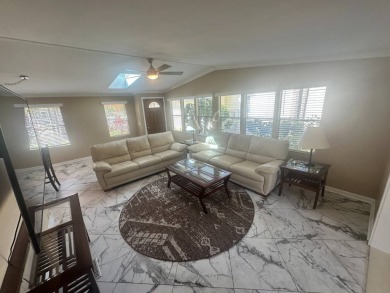 Lot Rent $1342.00 Monthly  Total square footage under A/C is on Del Tura Golf and Country Club in Florida - for sale on GolfHomes.com, golf home, golf lot