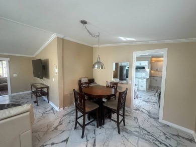 Lot Rent $1342.00 Monthly  Total square footage under A/C is on Del Tura Golf and Country Club in Florida - for sale on GolfHomes.com, golf home, golf lot